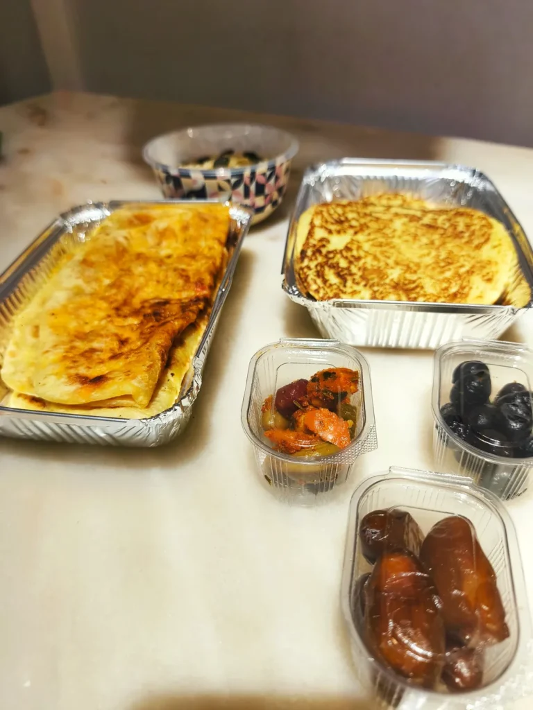 Fresh Moroccan vegan breakfast delivery with msemen, beghrir, olives and dates